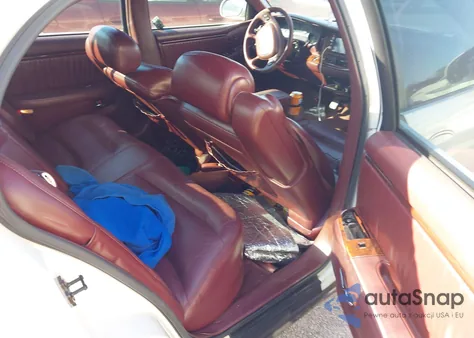 1999 Buick Park Avenue Ultra из США, поврежденный, VIN 1G4CU5218X4642520